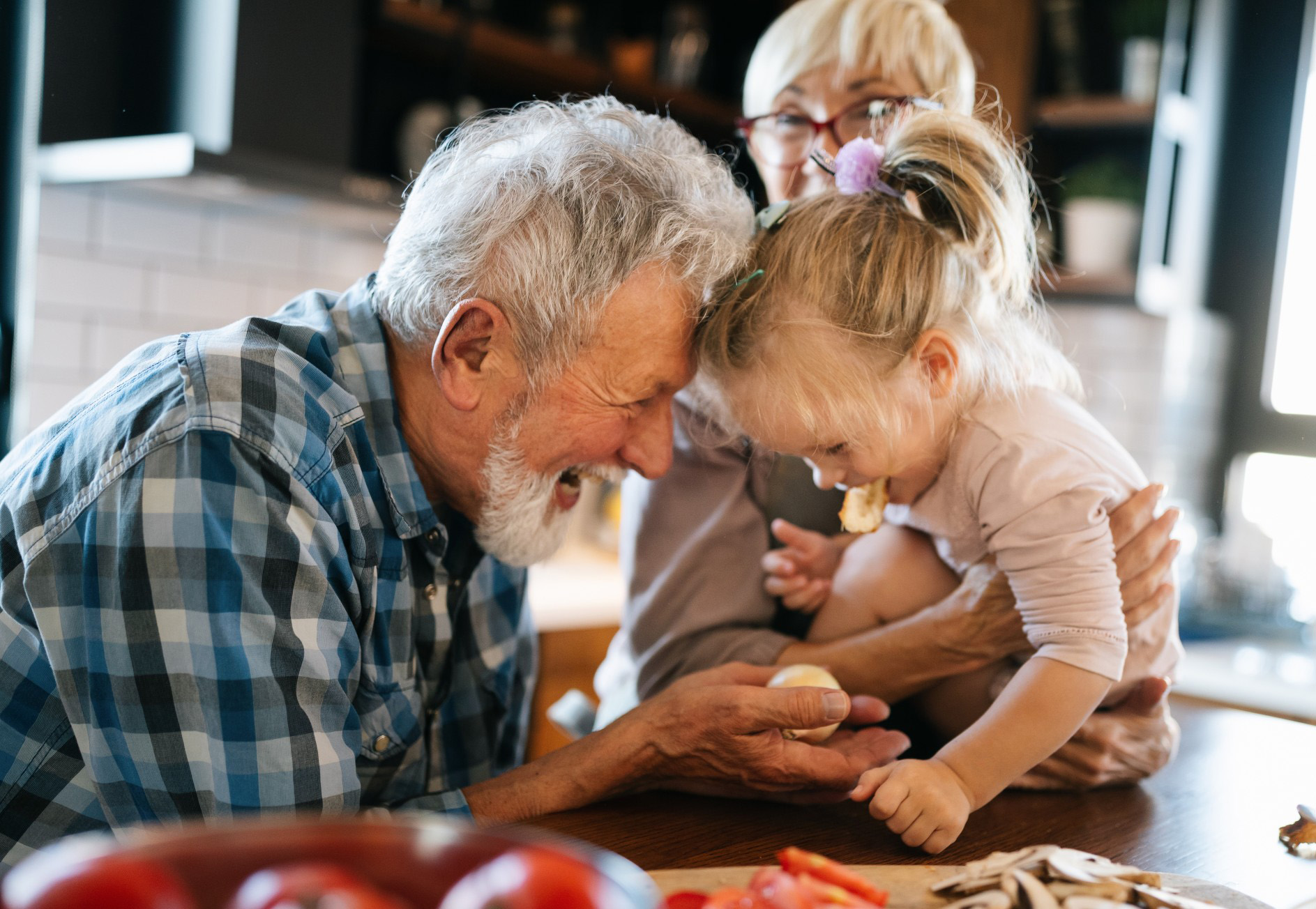 grandparents with granddaughter